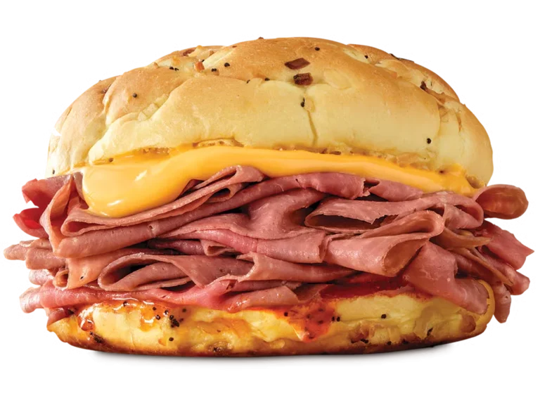 Arby’s Classic Beef 'n Cheddar sandwich with roast beef, cheddar cheese sauce, and red ranch on an onion roll