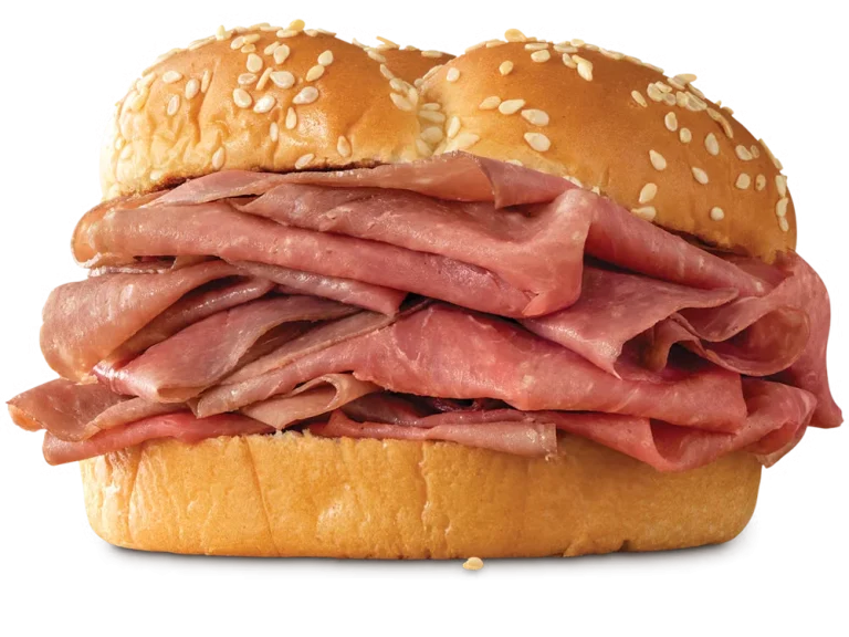 Arby’s Classic Roast Beef sandwich with thinly sliced roast beef on a toasted sesame seed bun