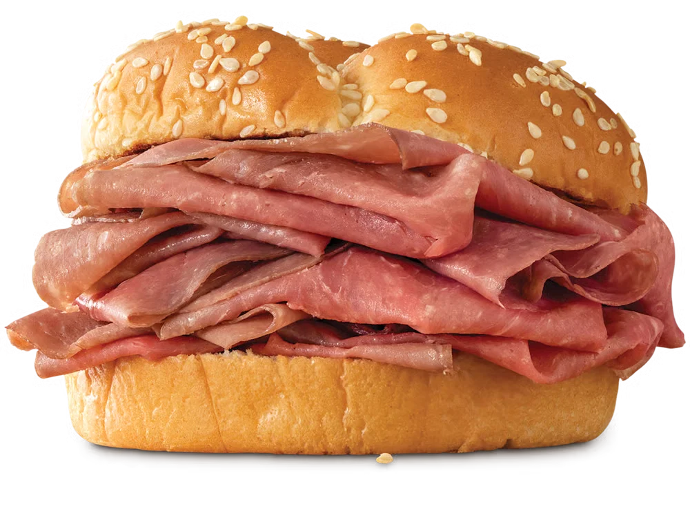 Arby’s Classic Roast Beef sandwich with thinly sliced roast beef on a toasted sesame seed bun